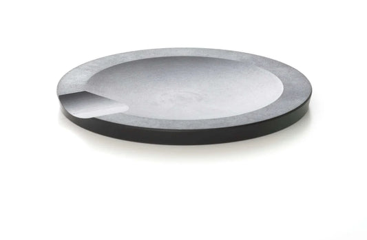 Slate round tool rest made of surgical steel, designed to keep utensils off counters.