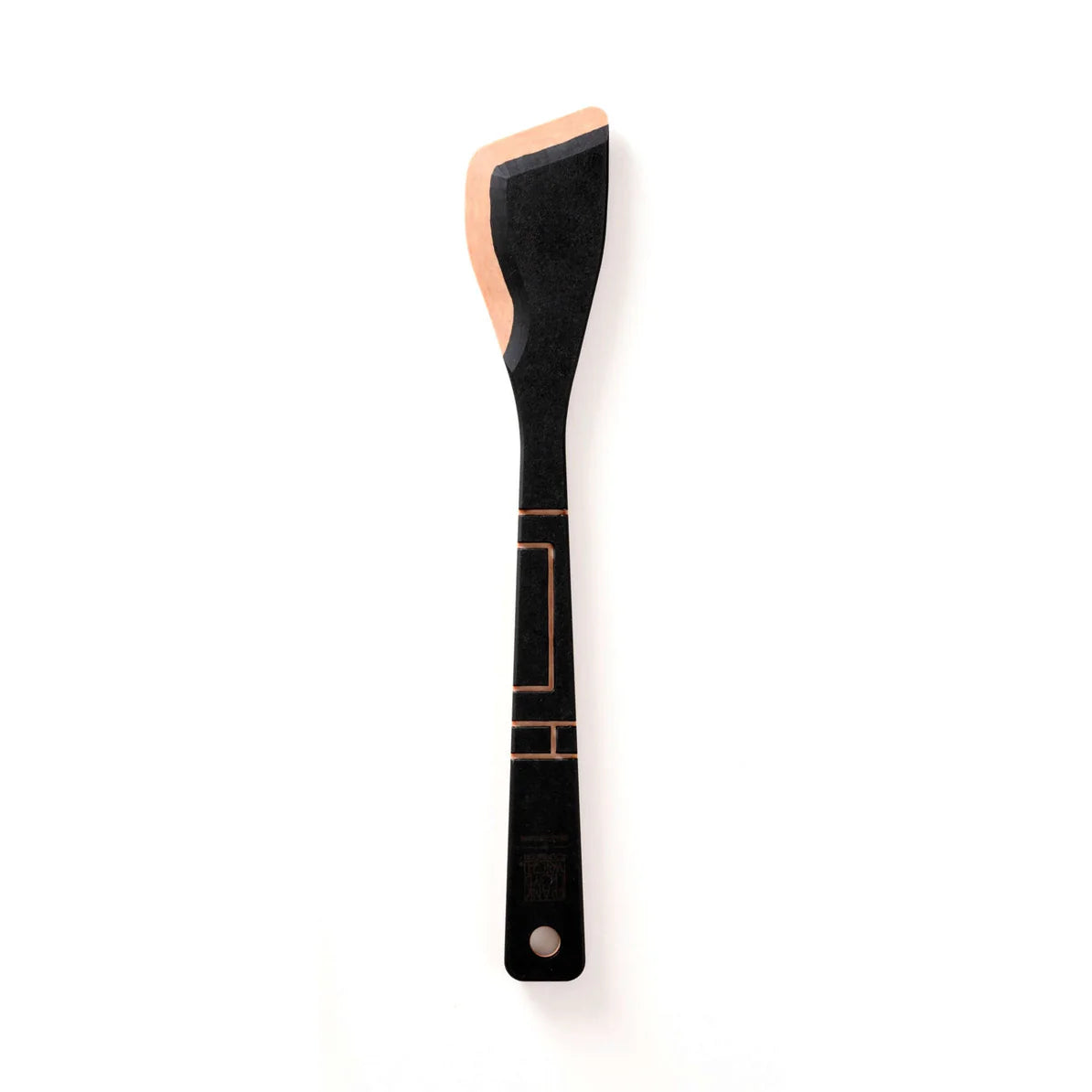 Frank Lloyd Wright Sauté Tool with a black handle and copper edge