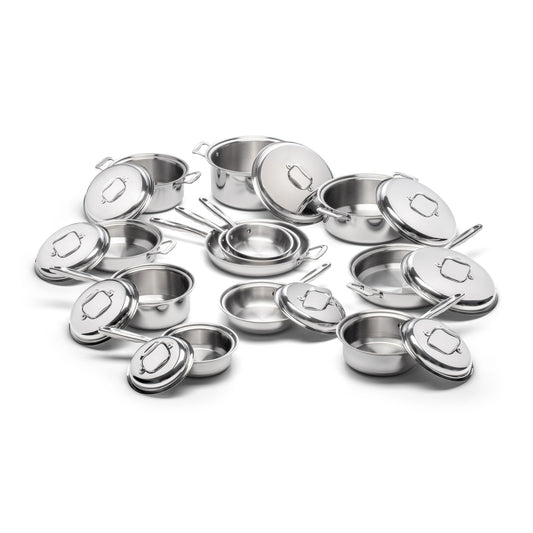 Collection of stainless steel cookware including saucepans and lids.