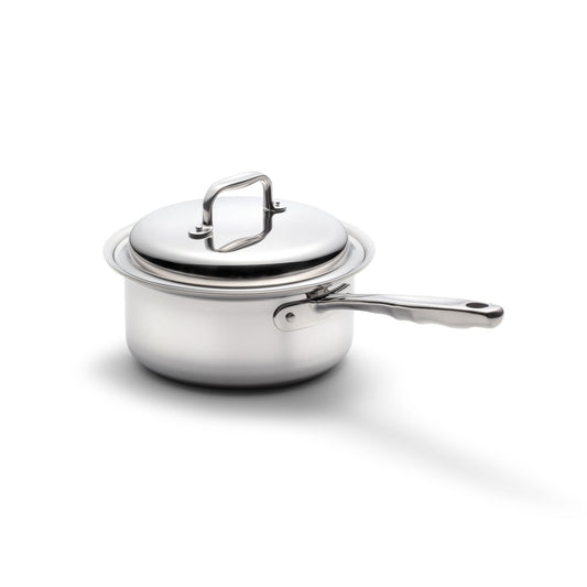 Stainless-steel saucepan with lid and long handle on white background.