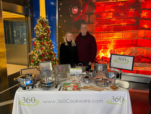 A display of 360 Cookware products with a Christmas tree in the background at Fox and Friends studio.