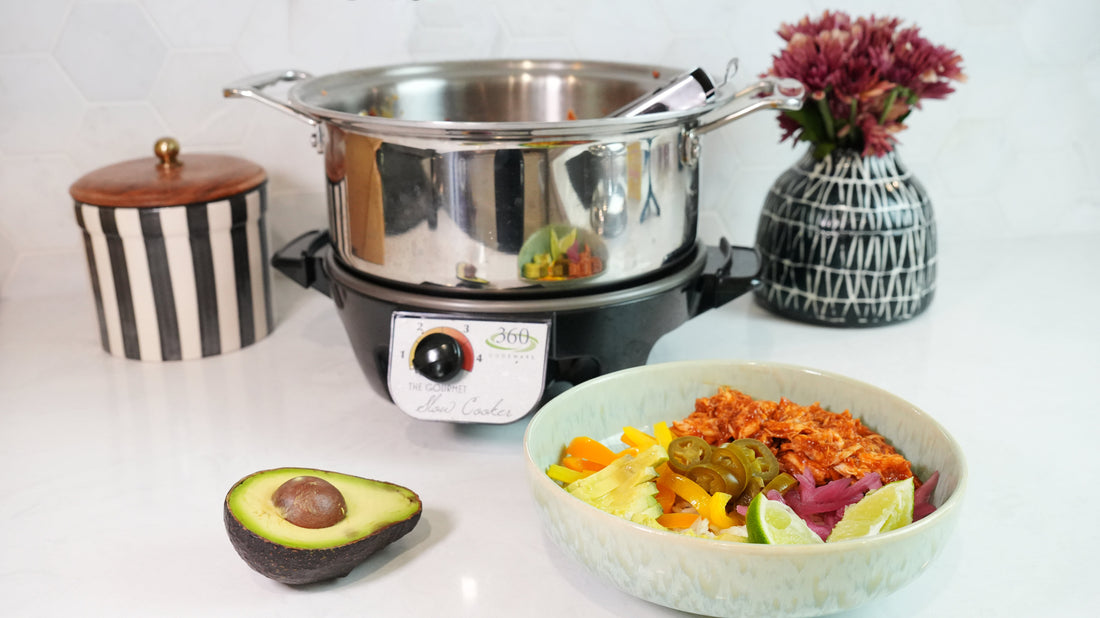 Shredded hot honey chipotle chicken bowl with pickled onions, jalapeños, lime and half avocado beside 360 slow cooker