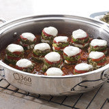 Vegetable stacks of zucchini, roasted red pepper, and mozzarella simmering in marinara in a 360 Cookware stainless sauté pan
