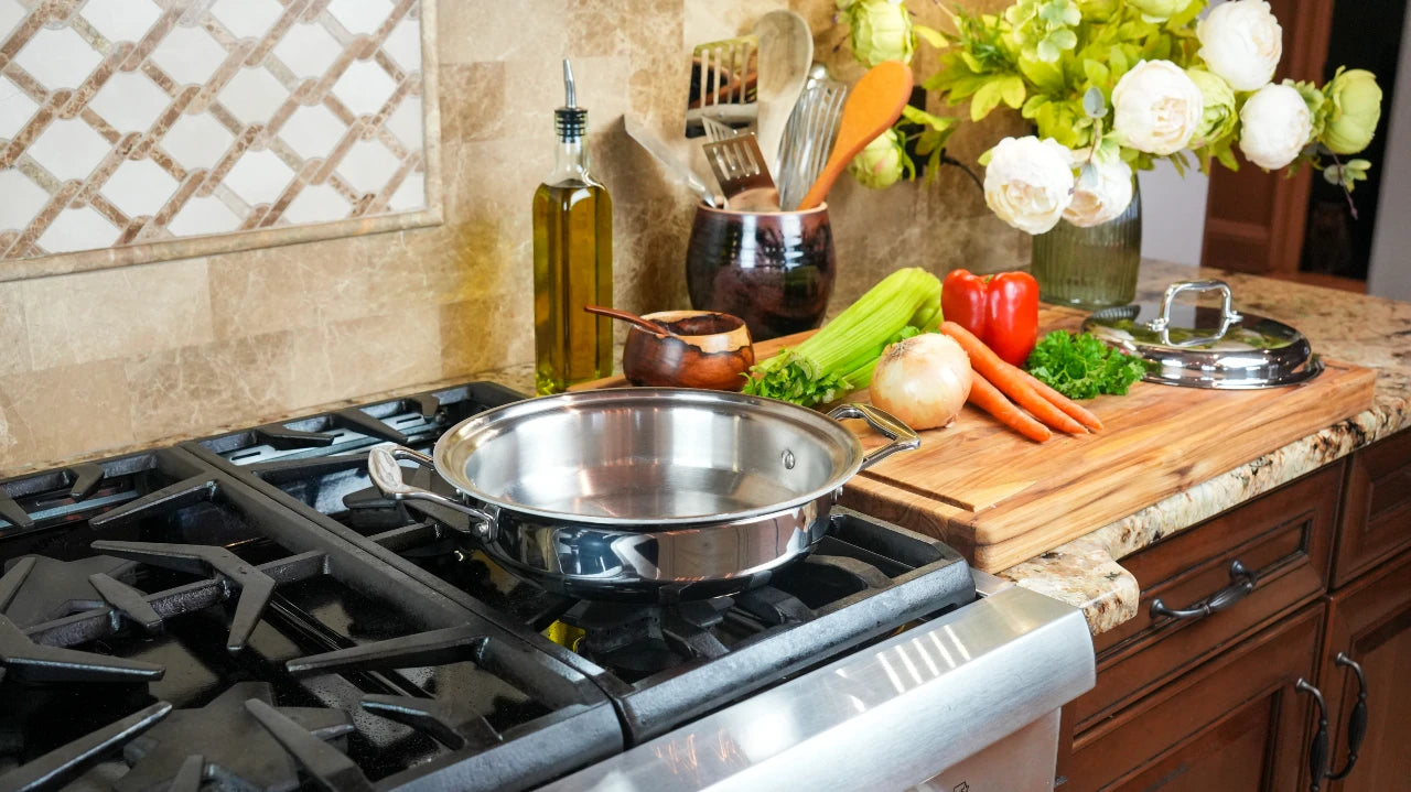 Kitchen stove with pots and pans, vegetables on a cutting board, and decorative elements.