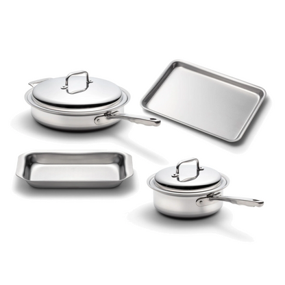 Four stainless steel cookware pieces including a covered pot, a baking tray, and a rectangular dish.