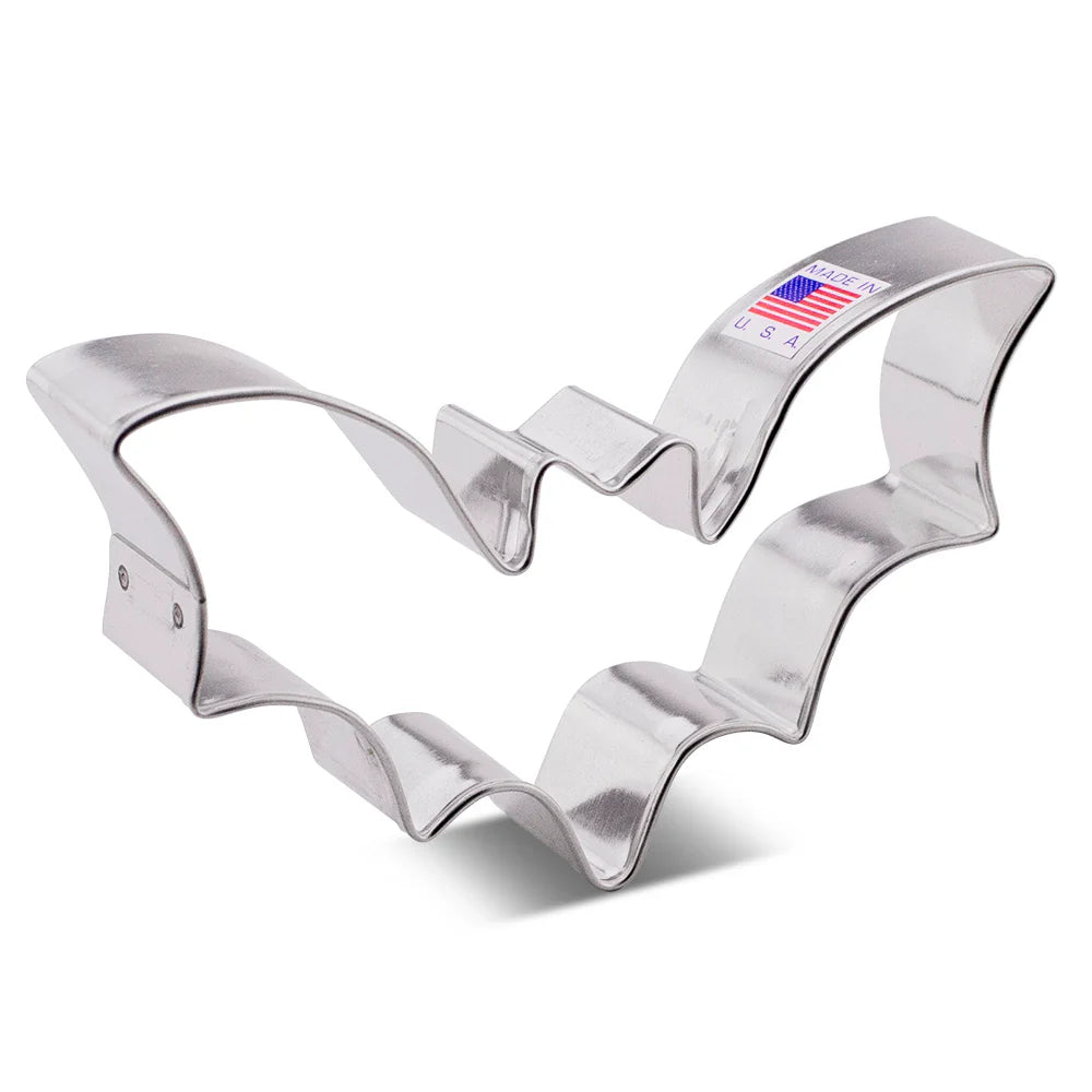 Metal bat-shaped cookie cutter with American flag sticker