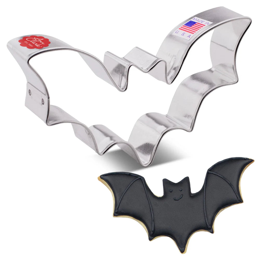 Bat shaped cookie cutter with a bat shaped cookie
