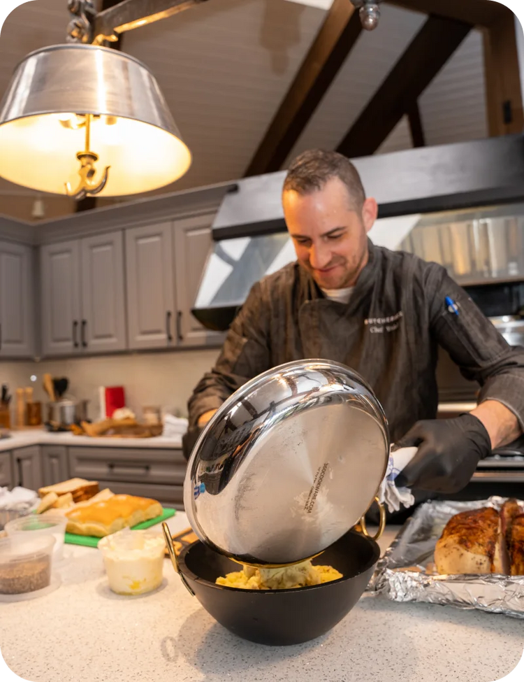 Chef cooking in 360 Cookware Stainless Steel Pan