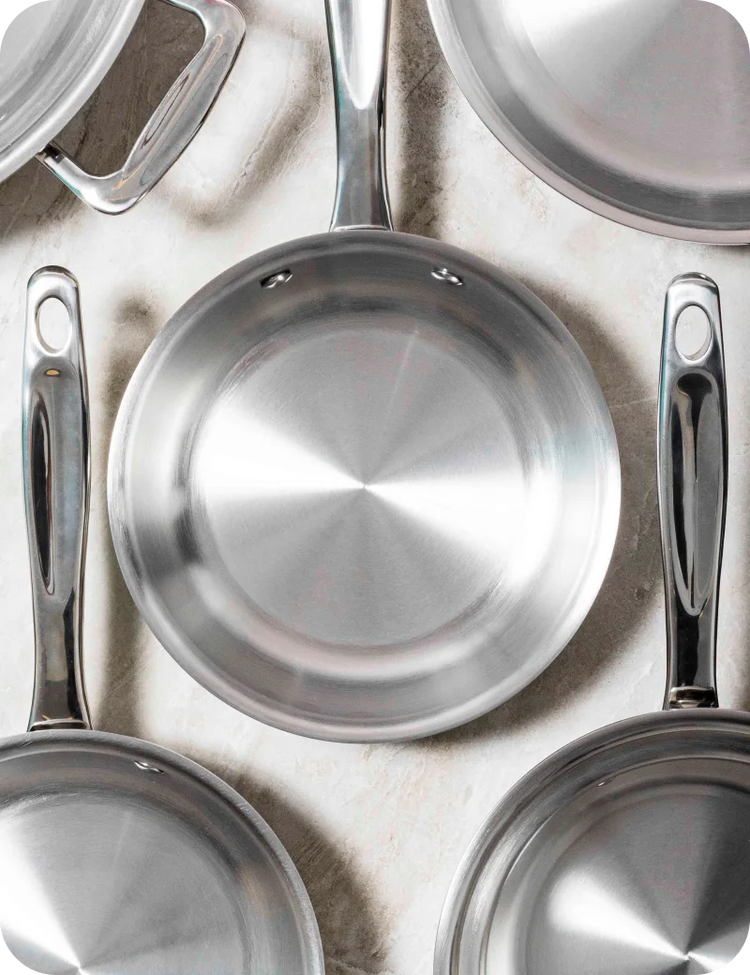 Set of 360 Cookware stainless steel cookware on a light background