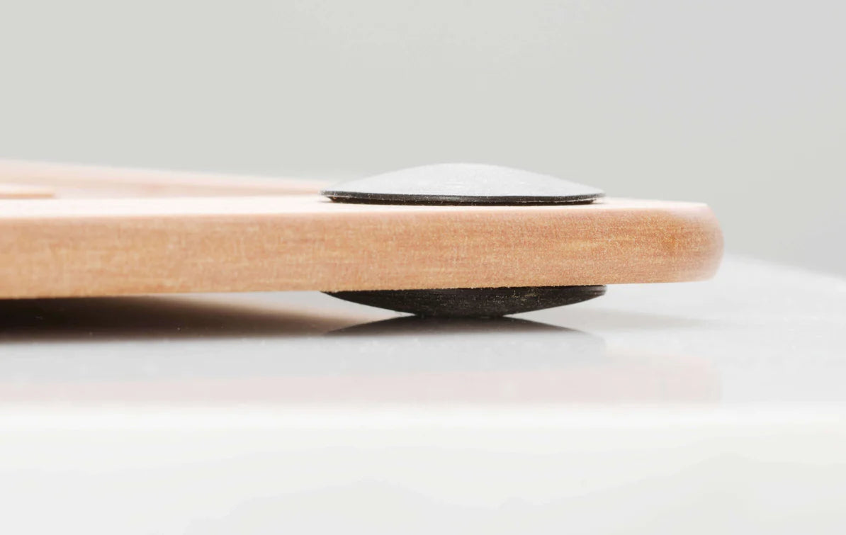 Close-up of All-In-One Series Cutting Board showing non-slip silicone feet