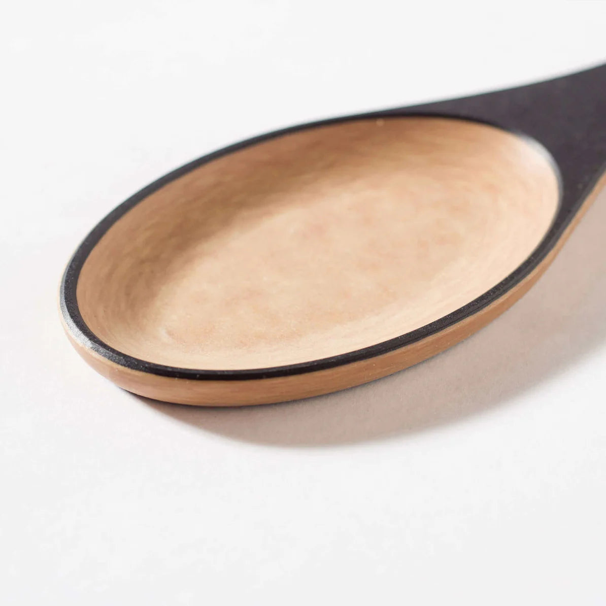 Frank Lloyd Wright Large Spoon with a smooth, rounded bowl and a wooden handle