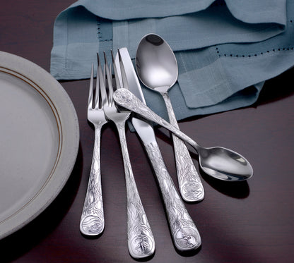 Earth Pattern Flatware set featuring forks, knives, and spoons with intricate designs on handles.