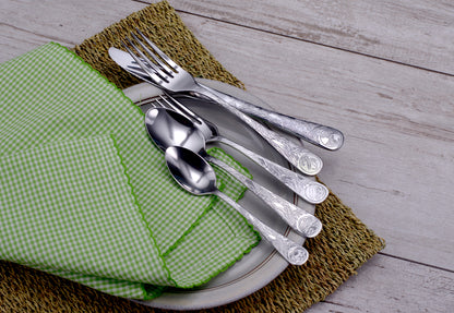 Earth Pattern Flatware set on a plate with green checkered napkin and woven placemat