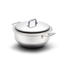 Top-front view of 6 quart stainless steel stockpot with lid, polished finish and loop handles on white background