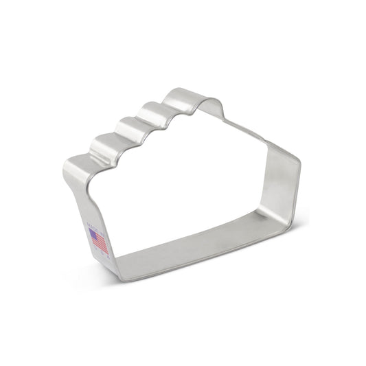 Metal pie slice cookie cutter with scalloped edge